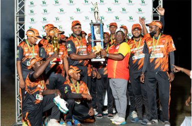 No 72 Cut and Load celebrate their successful title defence with the sponsor at the presentation ceremony on Sunday