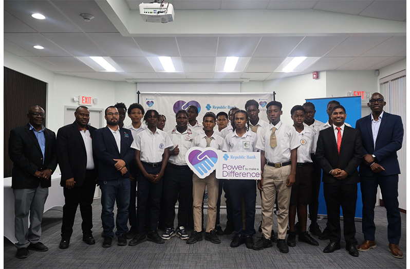 Petra Rep Troy Peters, Petra Director Troy Mendonca, Director of Youth Suresh Singh, RBL Guyana Managing Director Dr Toussant Boyce with student athletes at the launch