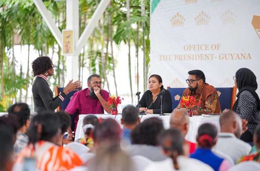 Chief Education Officer, Saddam Hussain; Education Minister, Priya Manickchand and President Dr. Irfaan Ali engage parents and educators following Wednesday’s devasting fire at Mae’s School (Office of the President photo)