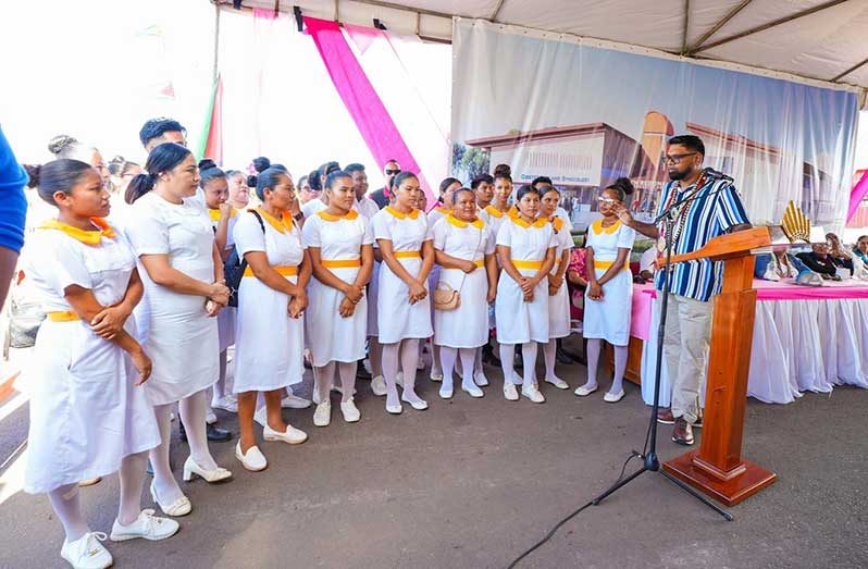 President Dr. Irfaan Ali among some of the student nurses from Region Nine (Office of the President photo)