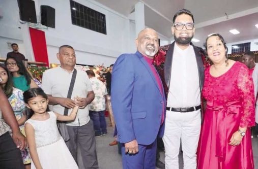 President Dr. Mohamed Irfaan Ali with Apostle Balgobind Ragnauth and Pastor Pauline Ragnauth at the LifeSpring Ministries Cathedral on the East Coast of Demerara on Christmas Day