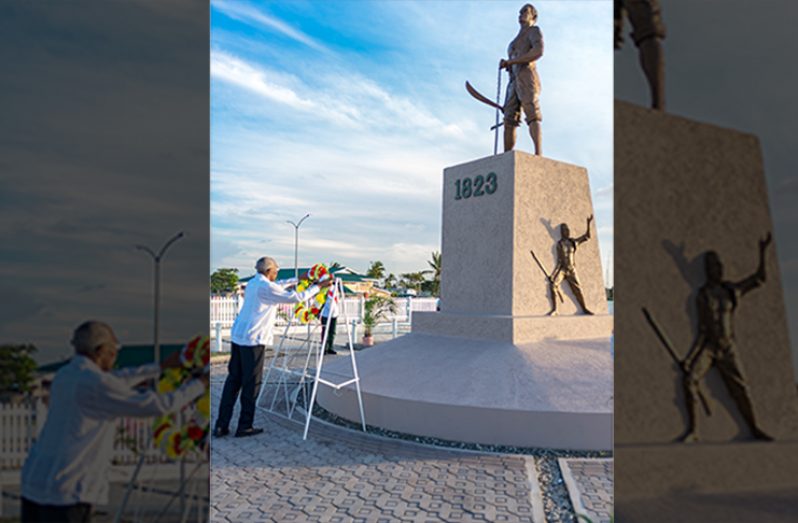 President David Granger laying a wreath at the 1823 Demerara Revolt Monument
