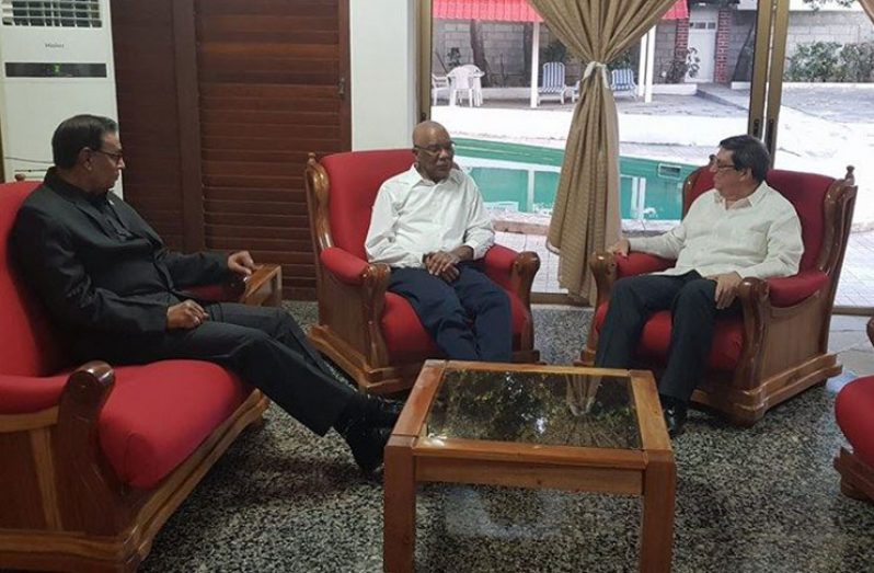 President Granger (centre), Cuban Foreign Minister Bruno Rodriguez Parrilla (right) and Guyana’s Ambassador to Cuba, Halim Majeed during a recent meeting