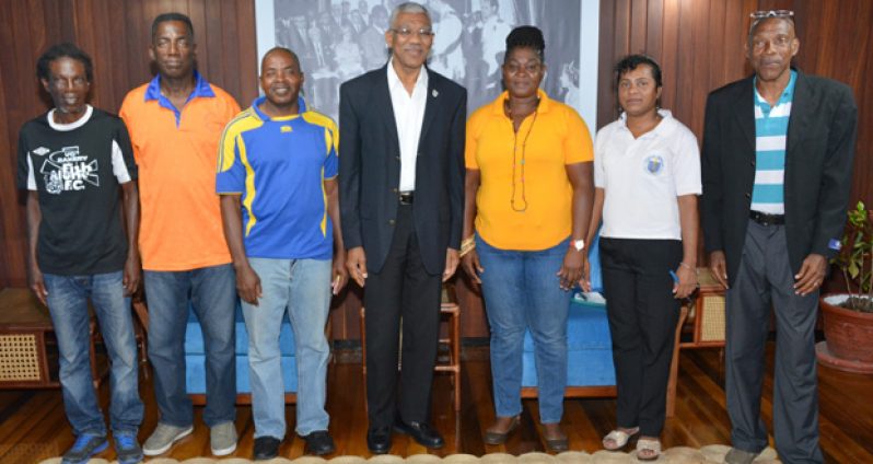 President David Granger (centre) is flanked by, from left: Mr Rickardo Greenidge, Mr Ivan Forde, Mr Gregory Small, Ms Tricia Browne, Ms Nazia Persaud and M. Roland Waithe, at the Ministry of the Presidency.
