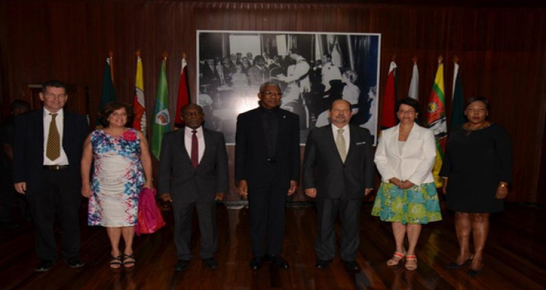 From left: Honorary Consul of Portugal in Guyana, Michael Correia Jnr; Mrs. Teles Fazendeiro (wife of the new ambassador); Minister Carl Greenidge; President David Granger; Ambassador Manuel De Jesus Teles Fazendeiro; Ministry of Foreign Affairs’ Director-General, Audrey Waddell; and Chief of Protocol, Esther Griffith, after the accreditation ceremony at the Ministry of the Presidency (Ministry of the Presidency photo)