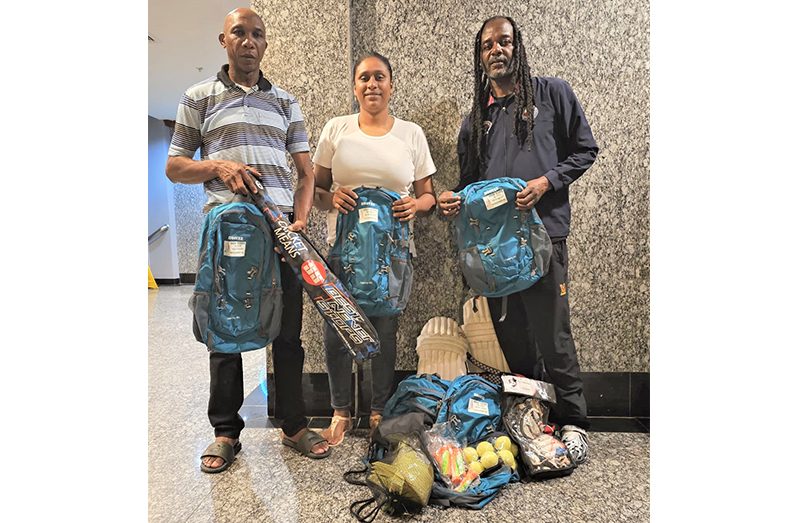 President Ms. Stacy Cuffy (PFA) received a donation from NY Tri State Coach Linden Fraser in the presence of GCA’s representative Shawn Massiah