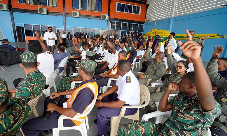 President Ali in discussion with members of the Air Corps at Timehri (Office of the President)