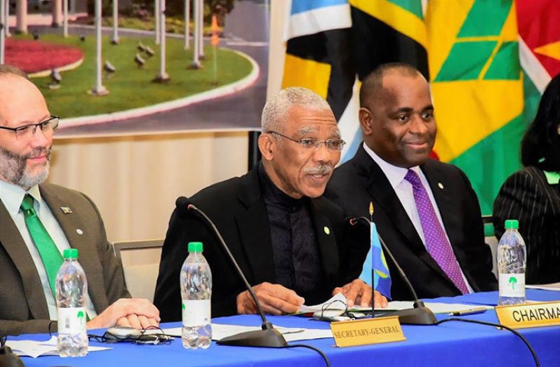 President David Granger (centre), delivers his address at the opening of the 28th Inter-Sessional Meeting of the Conference of Heads of Government of CARICOM, on Thursday at the Marriott Hotel, Georgetown, Guyana. Also in photo are Secretary-General of CARICOM, Ambassador Irwin LaRocque (left) and Prime Minister of Dominica, Roosevelt Skerrit (right)