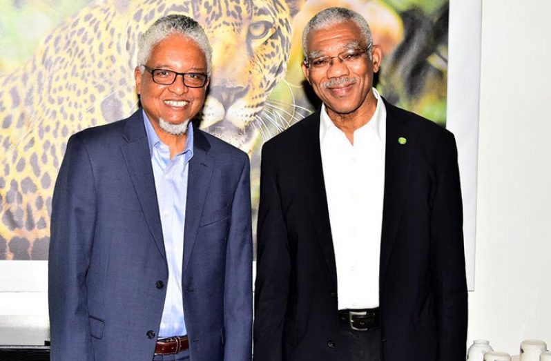 President David Granger (right) alongside Chancellor of the University of Guyana, Professor Nigel Harris.