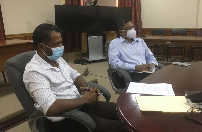 Region Five Chairman, Vickchand Ramphal (left) and Ministry of Health representative, Dr. Vishwa Mahadeo (right), at the press briefing on Wednesday in the region’s boardroom