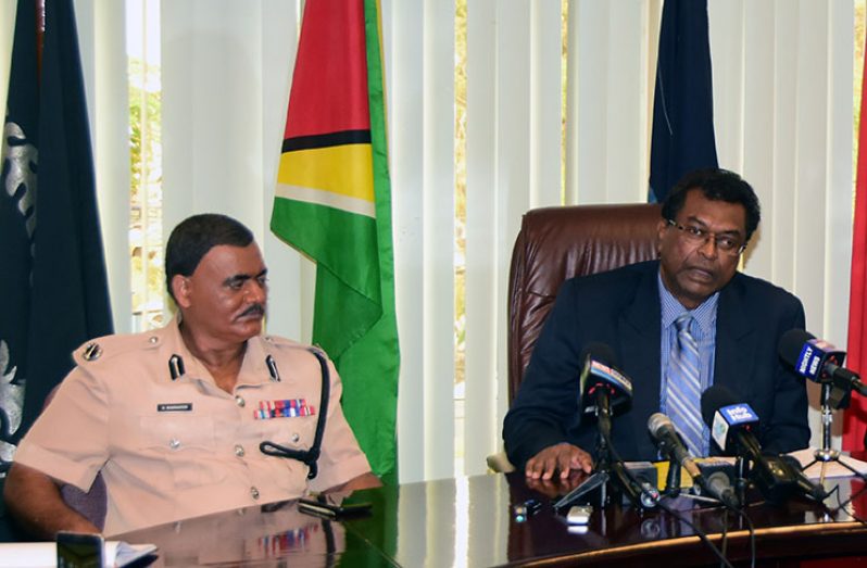 Public Security Minister Khemraj Ramjattan and acting Commissioner of Police David Ramnarine during the press conference (Adrian Narine photo)