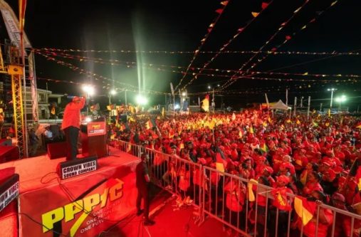 President Ali speaking to the large assembly of supporters at Anna Regina (DPI)