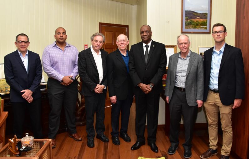 From left , Brud Drachman, Executive Vice President, PriceSmart Incorporated, Andron Alphonson, the local contact, Leon Janks, Board Member, PriceSmart, Minister of State,  Joseph Harmon,  Robert Price, Founder and Chairman of the Board of Directors and  David Price, President of PriceSmart Incorporated during the meeting on Wednesday today.