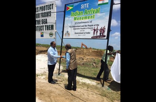 Prime Minister Moses Nagamootoo and Indian High Commissioner to Guyana, Venkatachalam Mahalingham , unveil the sign for the Indian National Monument