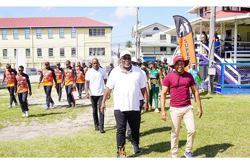 Prime Minister Brigadier (Ret'd) Mark Phillips bowled off the tournament. Alongside him is Chief Executive Officer for Kares Engineering Radesh Rameshwar at the Police Sports Club Ground