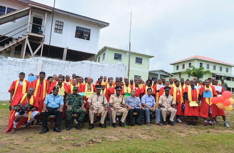 At Monday’s graduation ceremony at the Mazaruni Prison. Seated fourth right is, Acting Director of Prisons, Mr Gladwin Samuels; while at third and fifth right, respectively, are Regional Chairman, Mr Gordon Bradford, and Senior Superintendent, Mr Alexander Hopkinson  (Delano Williams Photo)