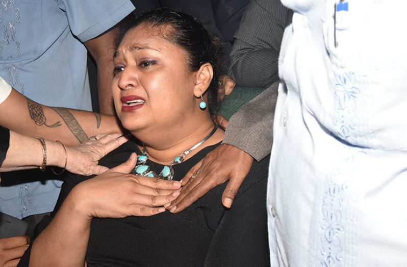 Opposition MP, Priya Manickchand cries after the commotion in the National Assembly Monday (Adrian Narine)