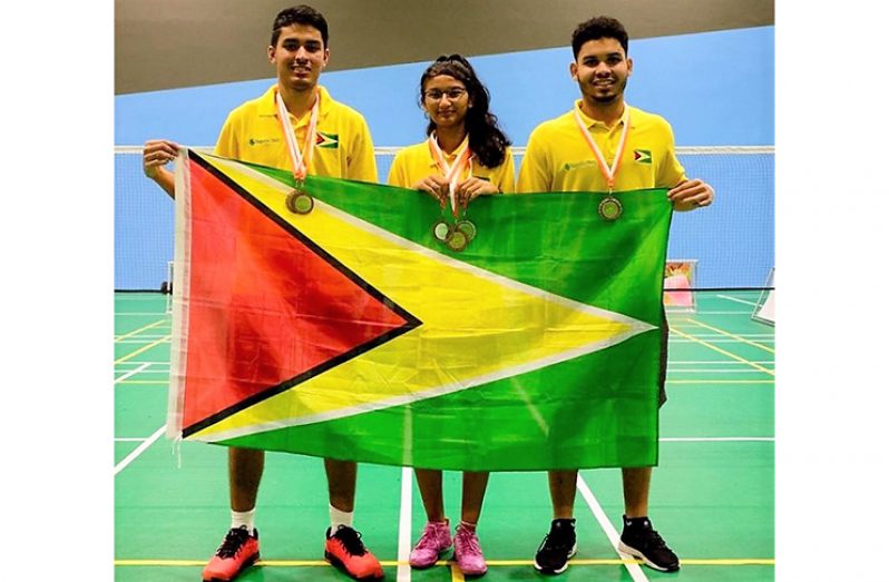 From left, Guyana’s medal-winning Senior team - Narayan Ramdhani, Priyanna Ramdhani and Jonathan Mangra.
