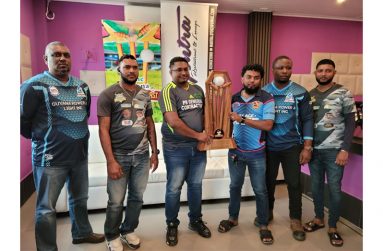 Some of the team captains holding the prized trophy