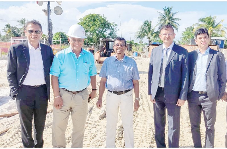 GWI Chief Executive Officer, Shaik Baksh (third left) and Project Manager, Richard Persaud (second left) with Toshiba Water Solutions Private Limited Director and Chief Executive Officer, Rajkumar Gupta (second right), Group Chief Financial Officer, Anil Chauhan (right) and Group Director, Sanjay Agrawal (left) at the project site on Friday