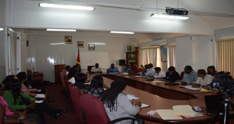 Permanent Secretary of the Ministry of Agriculture George Jervis, with ministry officials (centre), and Presidential Adviser on Youth Empowerment, Aubrey Norton,addressing stakeholders on the National Action Plan for Youths in Agriculture.