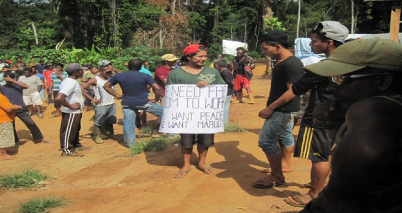 Miners of Marudi Mountain last November protested the threat of being evicted by large Canadian company Romanex Guyana Exploration Limited (file photo)
