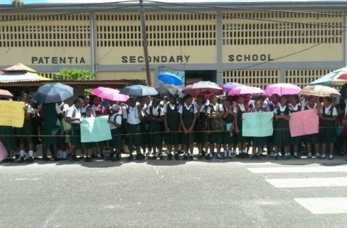 Students of the Patentia Secondary school protesting. [Tamica Garnett photo]