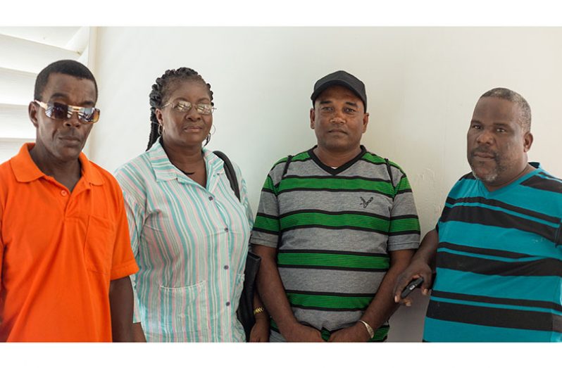 The four-person group of (from left) Linden Sutton, Berverley Sutton, Isaac Sarju and Claxton Thomas from the West Bank Demerara Free and Easy community on Wednesday visited Minister David Patterson to have him look into the issue of the road in the community (Delano Williams photo)