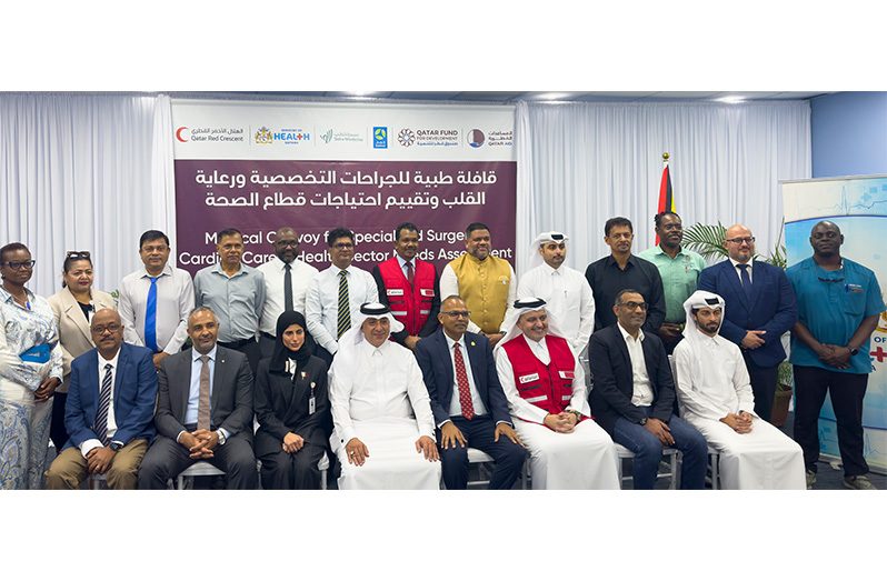(Seated fourth from left) Charge’d’ Affaires at the Embassy of the State of Qatar in Guyana, Mohammed Imrahim Al-Rumanihi; Minister of Health, Dr. Frank Anthony; Qatar Red Crescent representative, Mohammed Ahmed Al-Beshri; and (seated first from right) Qatar Fund for Development representative, Yousef Ahmad Y. A. Al-Mulla, flanked by other officials during the opening ceremony (Japheth Savory photo)