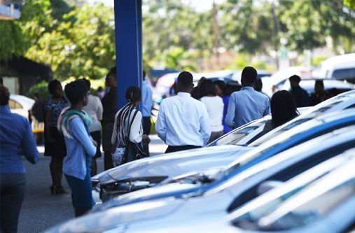 Staff at the Ministry of Education at Heroes Circle in Kingston, evacuate the building following an earthquake that struck earlier. Tremors were felt across several Caribbean islands.(Jamaica Gleaner photo)