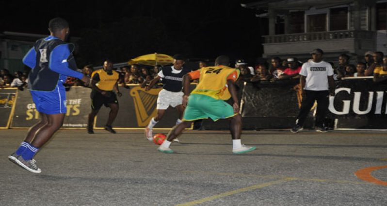 Part of the quarterfinal action in this year’s Banks DIH/East Coast Demerara Guinness ‘Greatest of the Streets’ Futsal football competition.