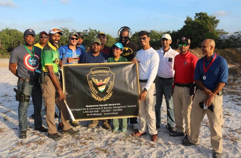 The smiling division winners of the GSSF Steel Challenge Match, sponsored by Queensway Security Service Inc. - Ryan McKinnon (left) and Pravesh Harry. (Photo Credit: Mr Stanford Howard)