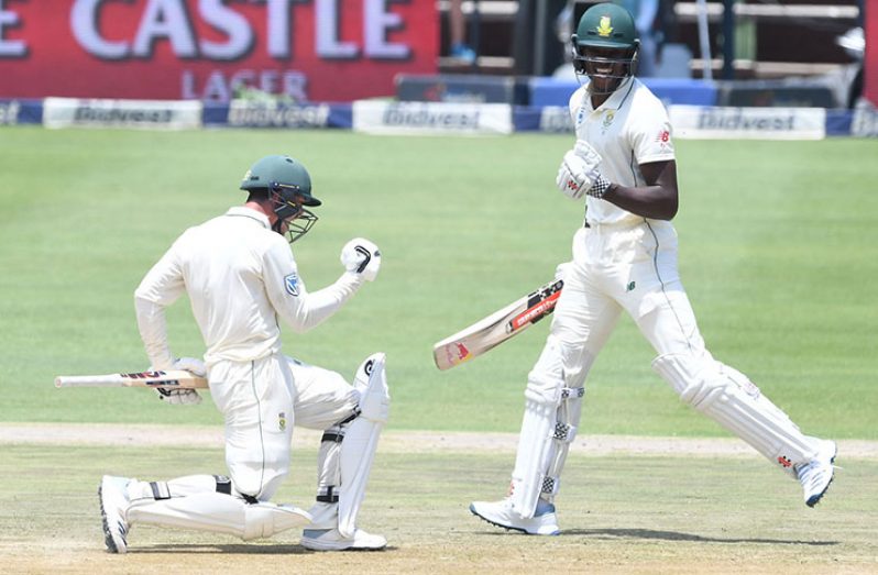 Quinton de Kock and Kagiso Rabada pumped their fists after de Kock got his first Test hundred in over two years ©Getty Images