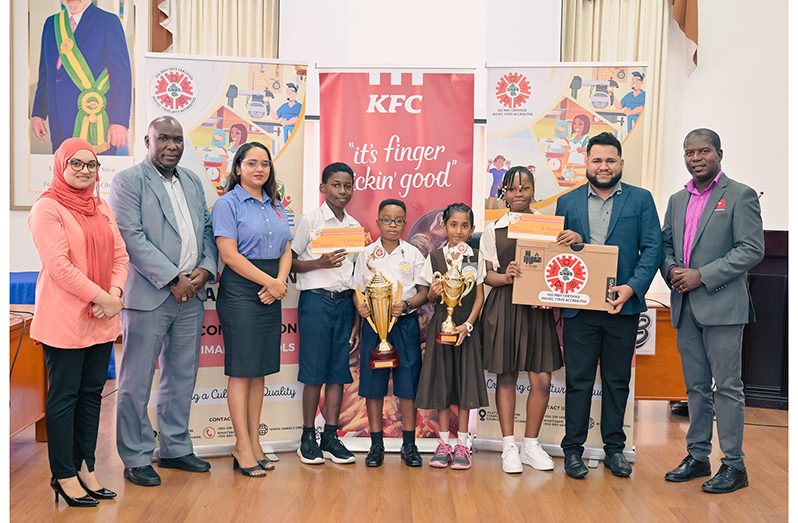 Winners of the standards in academia quiz competition pose with GNBS staff