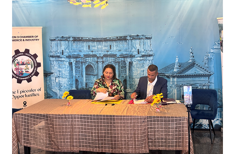 President of the R3CCI, Bhabita Albert (left) and Founder of Trailmasters Adventure Tours, Klaus Christopher Chin (right), inked an MoU set to expand tourism in Region Three