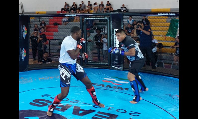 Guyana’s Carl Ramsey in full control of his Men’s Heavyweight MMA encounter against Mexican Juan Rodriguez in Monterrey