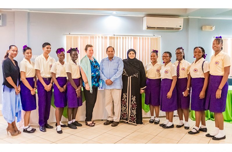 Prime Minister Moses Nagamootoo (centre) is flanked by UNICEF’s Resident Representative, Sylvie Fouet (his left), RCC Chairperson, Aleema Nasir and students at the Grand Coastal Hotel (Delano Williams photo)