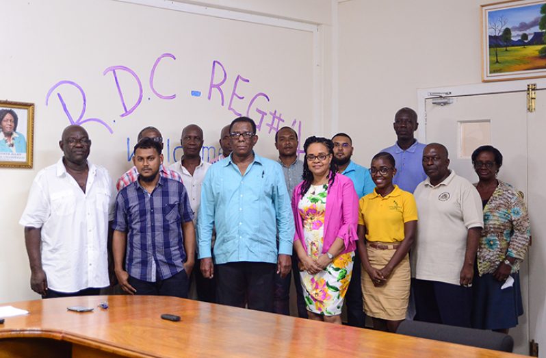 Region 4 (Demerara-Mahaica) Regional Democratic Council (RDC) Regional Executive Officer (REO), Pauline Lucas (fourth left), and Regional Vice-Chairman, Earl Lambert (third), with representatives of the contractors (Samuel Maughn photo)
