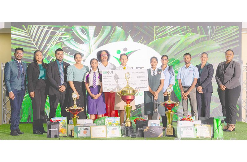 This year’s SHOUT 3.0 winners celebrate their victory alongside competition title sponsor, ExxonMobil Guyana, Recover Guyana's senior team and other officials (Recover Guyana photo)