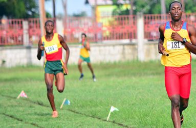 GPF’s Winston Dummett (first from right) finishes in first place, followed by GDF’s Edwin Tudor, in the men’s sprint medley, where both teams were disqualified for unsportsmanlike behaviour.