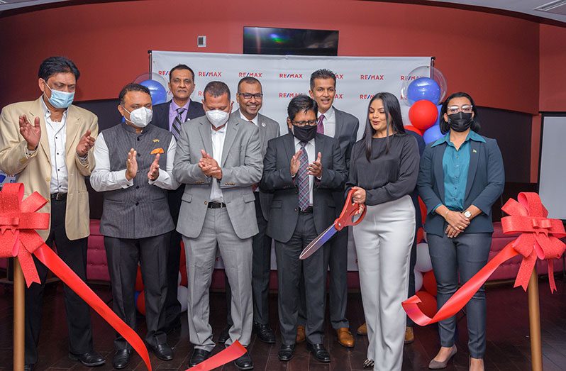 With the ceremonial ribbon-cutting, REMAX has pledged to raise the bar on real estate services in Guyana