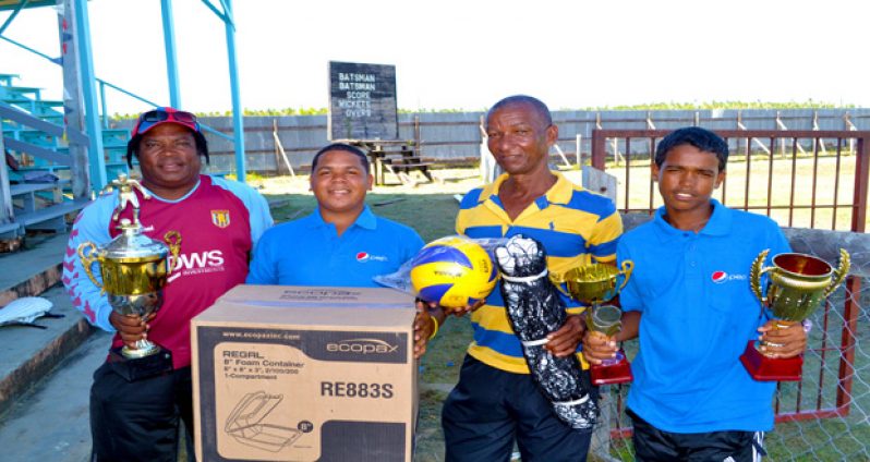 Joel Pike and Clement Brusch Jr of the RHT Pepsi Under-19 team hands over the donations to representatives of the two organisations.