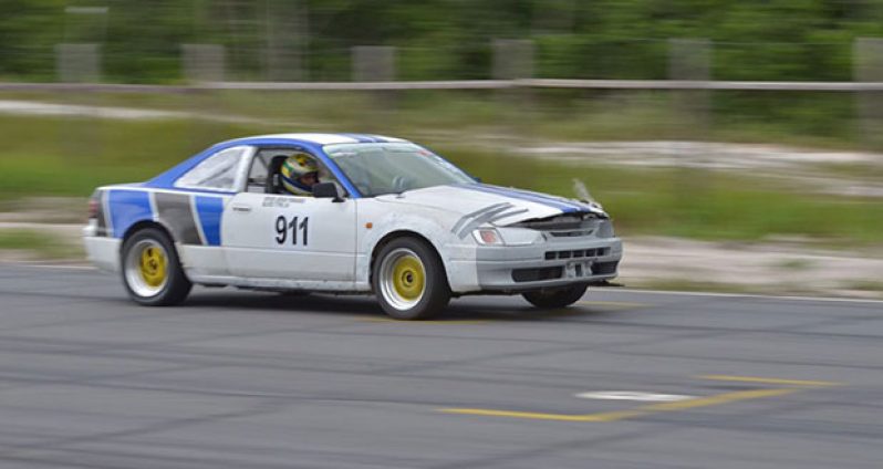 The 911 car of Ramchand’s Team Wreckers in action yesterday - (Sean Charles photos)
