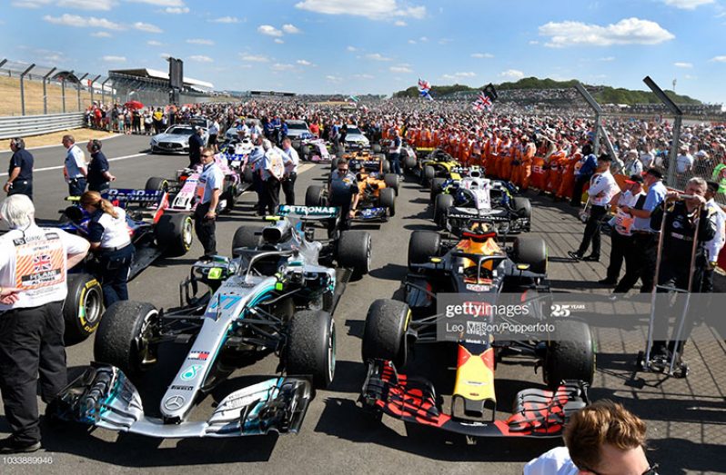 Cars stand in Parc ferme in the pit lane after the British F1 Grand Prix at Silverstone Circuit on July 8, 2018 in Northampton, England. (Photo by Leo Mason/Popperfoto via Getty Images)
