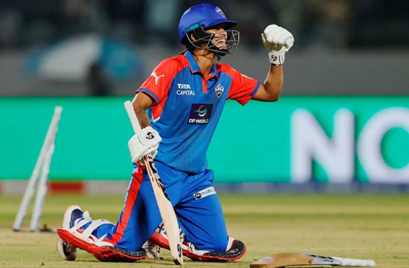 Radha Yadav exults after Delhi Capitals complete the two that won them the game  •  WPL