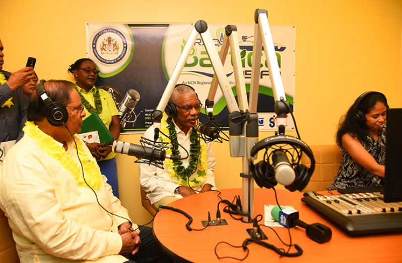 President David Granger and Prime Minister Moses Nagamootoo live on Radio Bartica with broadcaster Michella Abraham
Ali as Minister within the Natural Resources Ministry Simona Broomes looks on (Adrian Narine photo)
