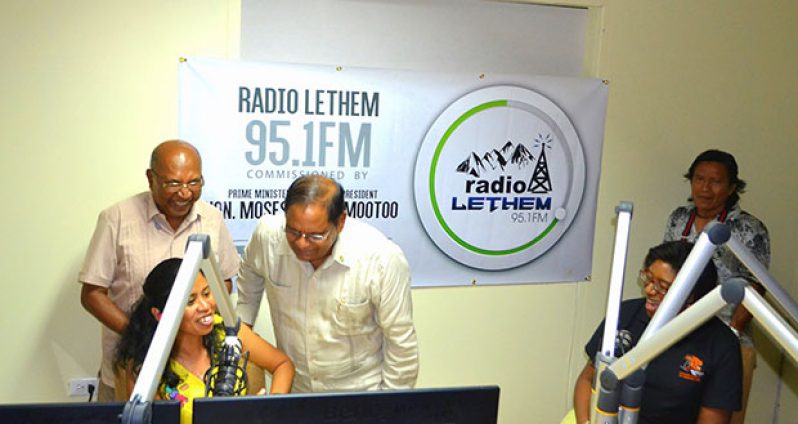 Prime Minister Moses Nagamootoo chats with NCN broadcaster Michela Abraham-Ali and Dr Rovin Deodat in Radio Lethem’s studio, while Minister of Tourism with responsibility for Telecommunications, Cathy Hughes, looks on. Region Nine’s Guy Marco, who spoke on air in the Macushi language, is at right