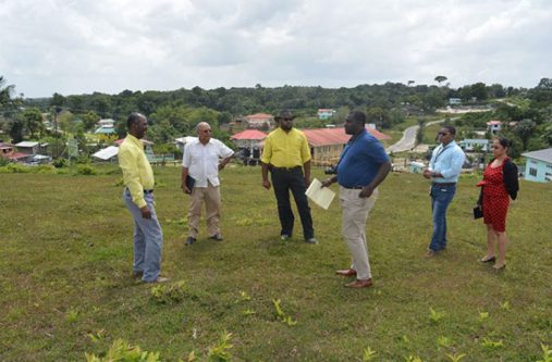 The Community Radio Project team along with regional officials assessing the compound of the resource centre to determine the best location for the dish