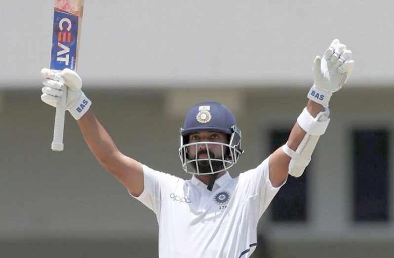 Ajinkya Rahane celebrates his 10th  Test century.