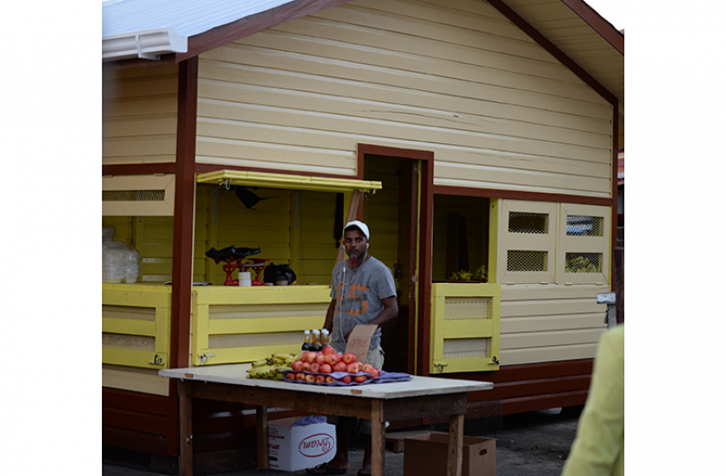 Fruit vendor, Rahim Husain, opened his new stall last Friday (Delano Williams photo)